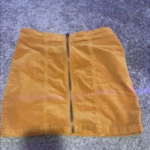 mustard/brown ish zip up skirt